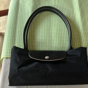 Longchamp tote bag black with black leather trim. Good condition